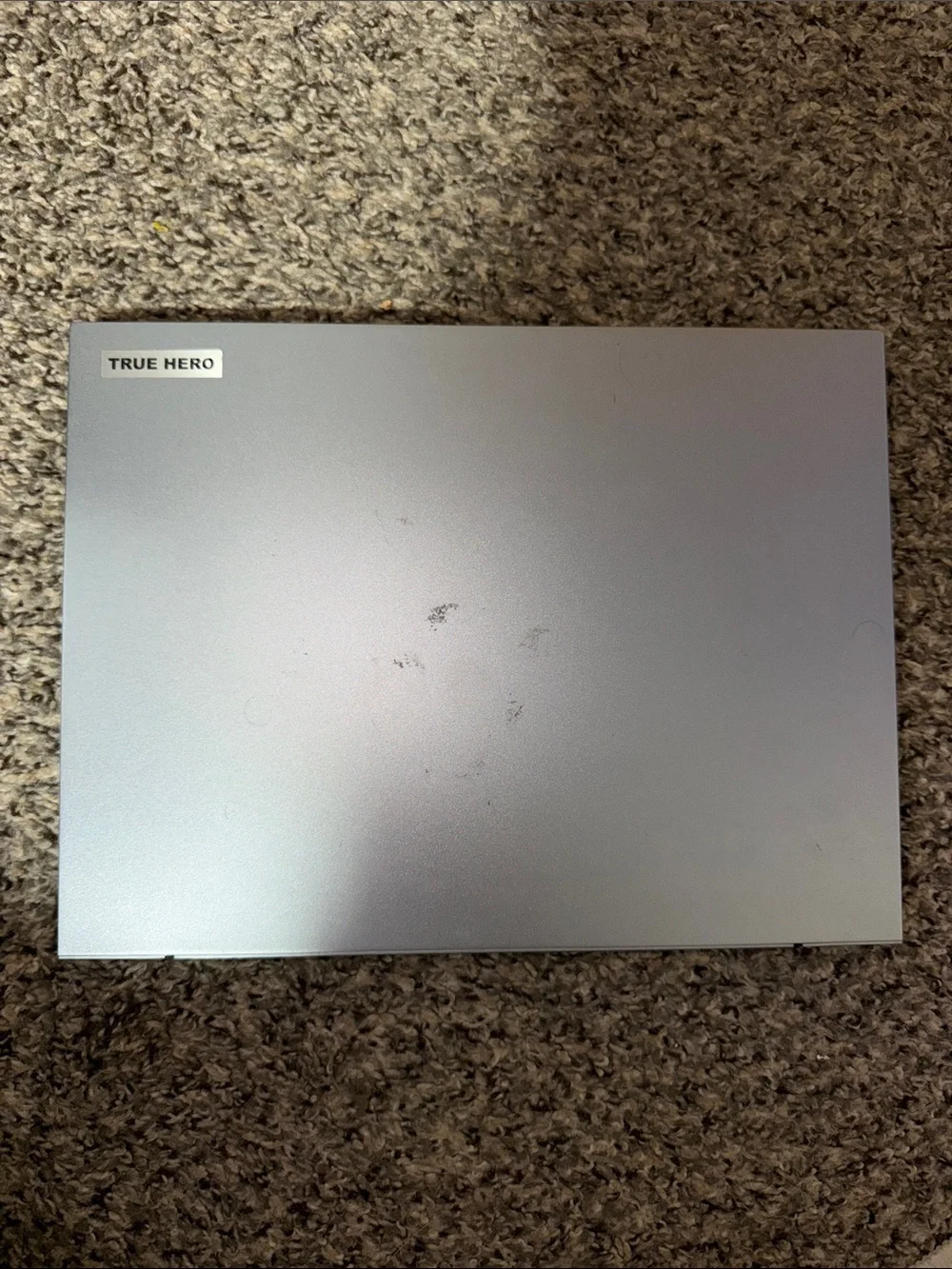 Silver Laptop with Intel Sticker - Sleek Portable Computer